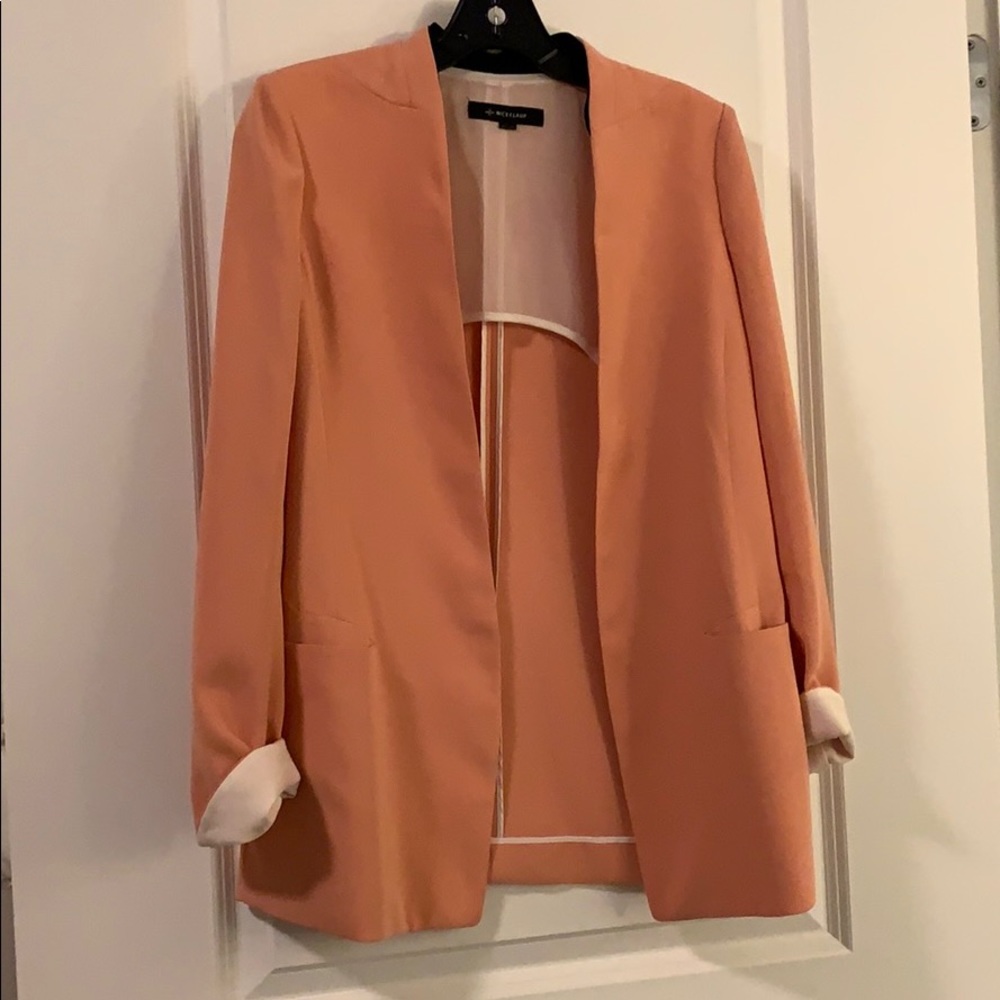 Bright orange blazer